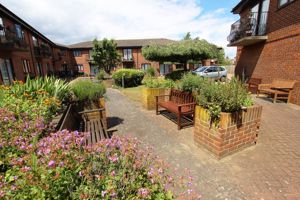 PHOTOS SHOW GENERAL VIEW OF RETIREMENT DEVELOPMENT- click for photo gallery